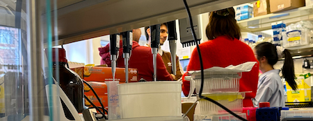 People chatting in a lab